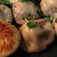Shanghai-Style Pan Fried Dumplings (8 Pc) · Choice of pork shrimp and pork or mixed veggies