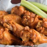 6 Chicken Wings · With celery and one sauce.