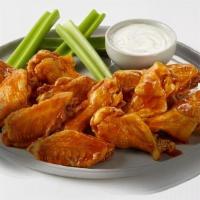 Traditional Wings · Crispy boneless wings with your choice of sauce.