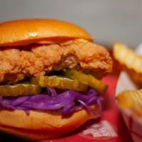 Gluten Free Spicy Fried Chicken Sandwich · Cabbage slaw, pickles, and spicy mayonnaise. Served in gluten-free bun With Classic Fries.