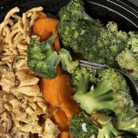Asian Bowl · Served with broccoli, crunchy Asian noodles, carrots, almonds, rice and a side of our house ...