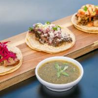 Three Tacos Deal · Select 3 tacos: chipotle chick, cochinito, garlic shrimp, the shorty, or vegan.