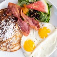 King'S Complete Breakfast · Two eggs any style and pancakes. Served with fruit and salad.