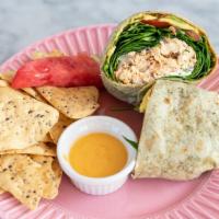 Chicken Avocado Wrap
 · Spinach wrap, chicken, red onion, avocado, sundried tomato aioli, goat cheese, spinach, and ...