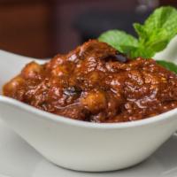 Sufi'S Special (V) · Vegetarian. Spicy sautéed eggplant, onion, garlic, chick peas and spicy tomato sauce.