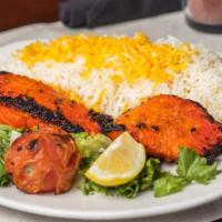 Salmon Kabob · Grilled and lightly marinated salmon, served with Baghala Polo (fava bean & dill saffron bas...