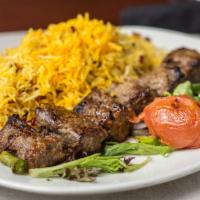 Chenjeh Kabob · Chunks of marinated sirloin cooked over an open flame and served with saffron basmati rice.