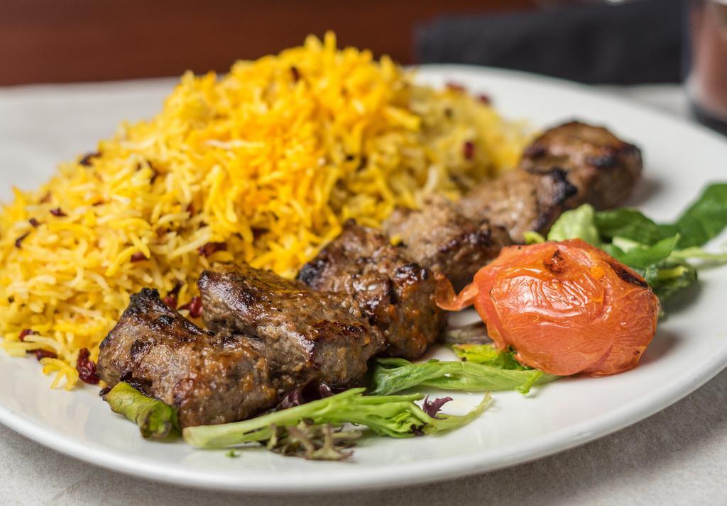 Chenjeh Kabob · Chunks of marinated sirloin cooked over an open flame and served with saffron basmati rice.