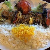 Shish Kabob · Marinated filet mignon and fresh market vegetables, cooked over an open flame and served wit...