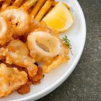 Fried Calamari With French Fries · Lightly dusted calamari rings & tentacles with fries.