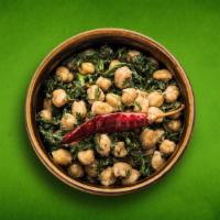 Savory Spinach Chickpeas (Vegan) · Chickpeas slow cooked to perfection in a thick ginger, garlic and spinach gravy.