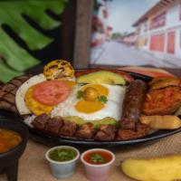 Bandeja Paisa (La Original) · Served with steak, beans, rice, pork, sausage, sweet plantains, fried eggs, avocado, fried p...