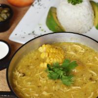Ajiaco · Chicken shredded soup with a variety of potato. Served with rice, corn pattie, and avocado.