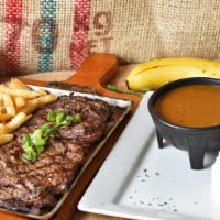 Carne Asada Con 2 Acompanantes · Grilled steak with 2 sides.