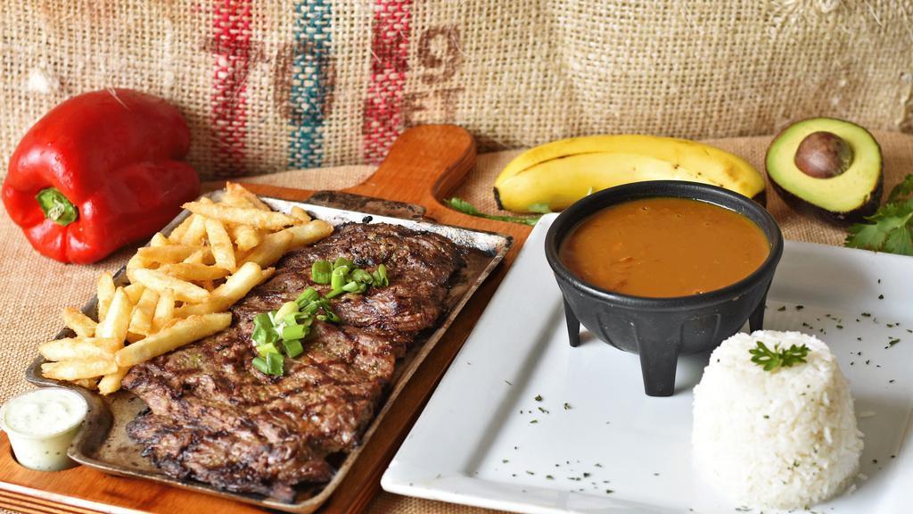 Carne Asada Con 2 Acompanantes · Grilled steak with 2 sides.