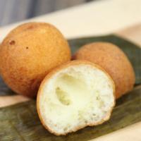 Bunuelos · Cheese fritters and pandebono.