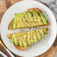 The Avocado · Topped with sliced avocado, sprinkled with black pepper and pink himalayan salt, and drizzle...