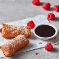 Raspberry Cheesecake Chimichanga · A sweet, creamy, and crunchy way to finish your meal. Two raspberry cheesecake-filled tortil...