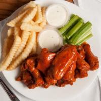 40 Pc Wings Family Combo · 40 pc Wings, Large Fries, 4 dressings, and 2 canned drinks.