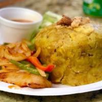Mofongo Chicken Breast · Grilled chicken breast and onions.