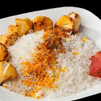 Chicken Rice · Chunks of marinated chicken breast, skewered and char-broiled to perfection served in bed of...