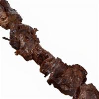 Tenderloin Chenjeh Kabob · Chunks of marinated tenderloin, skewered and char-broiled to perfection.