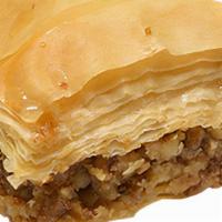 Walnut Baklava. · A delicious traditional dessert made of layers of crispy golden brown phyllo pastry, filled ...
