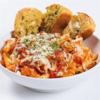 Baked Ziti · Traditional Italian penne pasta baked and sauced with our marinara, ricotta and melted mozza...