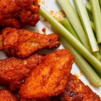 Smokin Natural Wings (9 Pcs) · Nine-piece chicken wings lightly fried and seasoned.