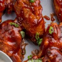 Smokin' Bbq Wings (9 Pcs) · Nine-piece chicken wings tossed in BBQ sauce.