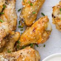 Smokin' Garlic Parmesan Wings (9 Pcs) · Nine-piece chicken wings tossed in garlic Parmesan.