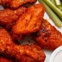 Smokin’ Natural Wings (6 Pcs) · Six-piece chicken wings lightly fried and seasoned.