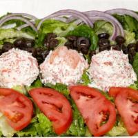 Seafood Salad · From the sea. Crab and shrimp salad, mix green, tomato, chopped onions, black olives and lig...