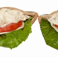Chicken Salad · Freshly baked chicken salad, provolone, mix greens, tomato.