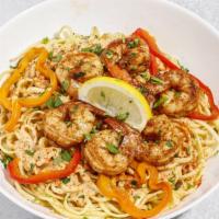 Shrimp Alfredo · Shrimp on top of Creamy  Parmesan Alfredo Sauce with sauteed tri-colored bell peppers on top...
