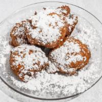 Fried Oreos  · 5 Oreos Deep Fried to Perfection until Golden Brown Dusted with Powdered Sugar