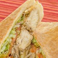 Jerk Chicken Sandwich · Classic Caribbean! Spicy jerk chicken breast is topped with swiss cheese, dill pickles, must...