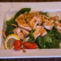 Grilled Chicken Salad · A large chicken breast on a bed of chopped romaine lettuce, spinach, onions, tomatoes, avoca...