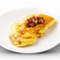 Irish Omelette · Secret corned beef hash recipe & Swiss cheese. Served with Pancakes or Toast.