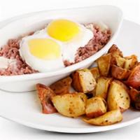 Homemade Corned Beef Hash · Topped with 2 eggs any style.. Served with your choice of potatoes.