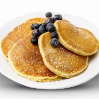 Blueberry Pancakes · 6 buttermilk pancakes filled with blueberries. topped with fresh blueberries and powdered. s...