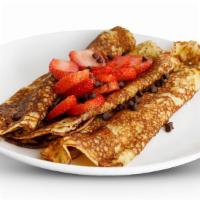 Chocolate Chip & Strawberry Crepes · Fresh strawberries and chocolate chips with warm strawberry syrup and powdered sugar.