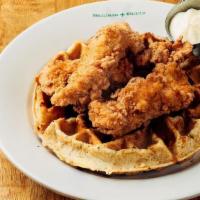 Fried Chicken & Cheddar Waffle · Fried Chicken Tenders atop our Signature Cheddar Waffle. Served with Real Maple Syrup & Hone...