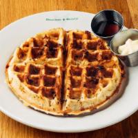 Cheddar Waffle · Our Signature Cheddar Waffle served with Real Maple Syrup & Honey Butter. Choose Regular or ...