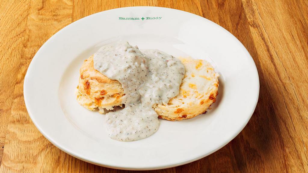 Biscuit And Gravy · From scratch Buttermilk Cheddar Biscuit and Housemade Sausage Gravy