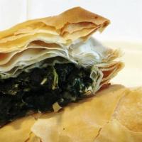 Spanakopita / Spinach Pie · Filo dough, Feta cheese, spinach, onions, extra charge with melted Mozzarella cheese.