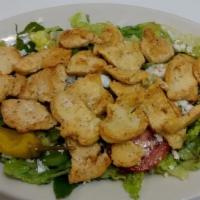 Large Chicken Breast Salad · Greek salad topped with strips of chicken breast.