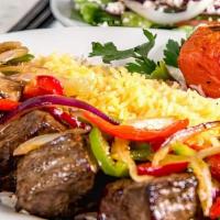 Lamb Kabob · Six pieces of char-broiled tender fillet of lamb cooked on open fire to perfection.