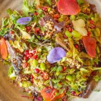 Mixed Baby Greens & Quinoa · Soft Baby Greens, Edamame, Pomegranates, Chia Seeds, Shaved Radish, Piquillo Vinaigrette.