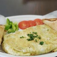 Western Omelet · Ham, onion, cheese, green pepper.